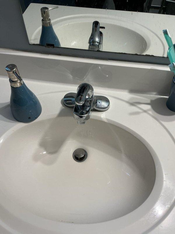 Completed faucet repair service including aerator replacement on bathroom sink and cartridge replacement on shower valve control. Performed comprehensive plumbing inspection throughout the residence to verify all fixtures were operating properly with no leaks or issues detected.