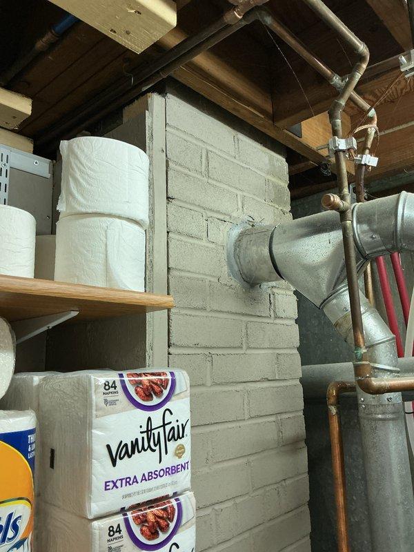 Provided estimate for tankless water heater installation to replace existing conventional tank-style water heater in basement utility area. Assessed current plumbing infrastructure including copper and galvanized steel piping, existing water treatment systems, and available space for equipment installation and venting requirements.