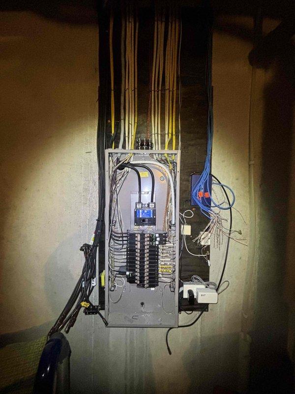 Responded to electrical issue where ceiling fan and light in master bedroom were inoperative and causing breaker to trip. Upon arrival, accessed main electrical panel to diagnose the fault. Inspected circuit breaker configuration and identified the affected circuit serving the master bedroom. Traced wiring connections and verified proper breaker operation. Reset tripped breaker after determining the circuit was overloaded or experiencing a short condition. Tested ceiling fan and light fixture to confirm restoration of power and proper functionality. Verified all connections at the panel were secure and properly torqued. Confirmed no additional circuits were affected and that the breaker held under normal load conditions. System restored to full operation with no further tripping observed.
