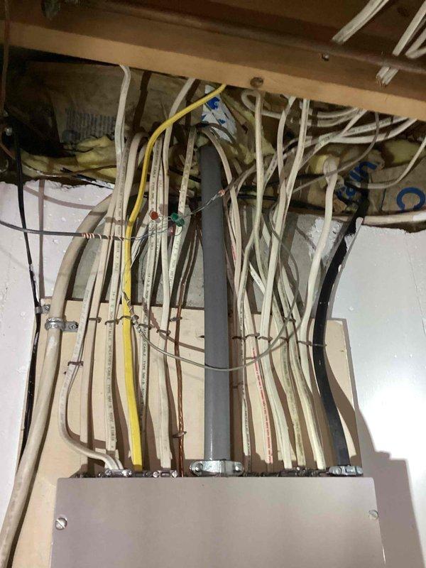Completed electrical estimate for installation of transfer switch to integrate existing Generac GP8000E portable generator with main electrical panel. Assessed current Cutler Hammer panel configuration, existing conduit routing, and determined requirements for proper transfer switch installation to eliminate need for extension cords throughout residence during power outages.