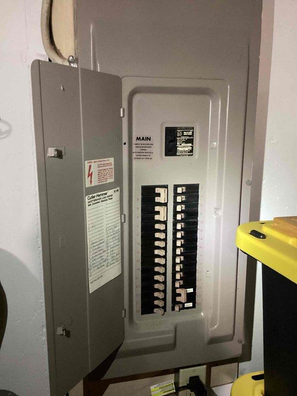 Completed electrical estimate for installation of transfer switch to integrate existing Generac GP8000E portable generator with main electrical panel. Assessed current Cutler Hammer panel configuration, existing conduit routing, and determined requirements for proper transfer switch installation to eliminate need for extension cords throughout residence during power outages.