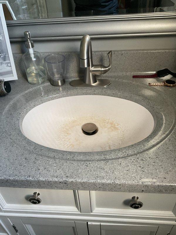 Responded to service call for non-operational garbage disposal unit with no power or sound. Upon arrival, verified disposal was completely inoperative with no humming or electrical activity detected. Updated customer contact information in system for future service coordination. Documented existing conditions with photographic evidence of plumbing fixtures in service area.
