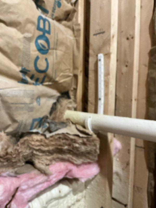 # PRSUMP-Sump Pump Problem

Responded to basement flooding complaint and performed comprehensive inspection of dual sump pump system including both primary and secondary pumps. Examined PVC discharge piping configuration, verified pump operation, and assessed plumbing installation within unfinished wall cavity. Documented existing conditions showing vertical discharge lines with multiple fittings, check valves, and electrical connections for both pump systems to determine cause of recent flooding event.