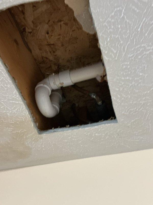 Replaced tub drain assembly and recaulked all fixtures within the shower enclosure. Access was gained through the ceiling below to properly install the new drain assembly and ensure proper connection to existing plumbing. All fixtures were resealed with fresh caulking to prevent water intrusion and maintain a watertight seal.