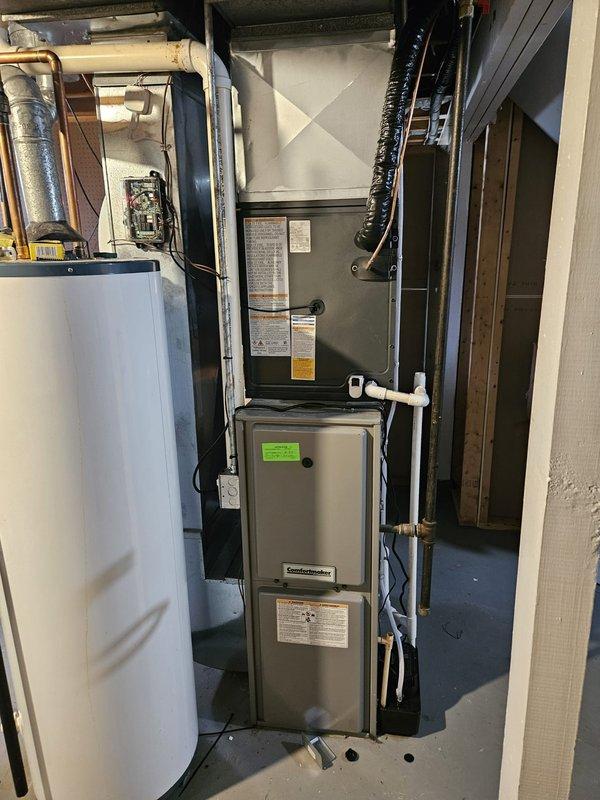 Completed installation of ductless mini-split air conditioning system in residential property. Mounted indoor wall unit in living space with proper clearances and positioned for optimal air distribution. Installed outdoor condenser unit and completed all refrigerant line connections, electrical wiring, and condensate drainage per manufacturer specifications. System tested and verified operational with all safety controls functioning properly.