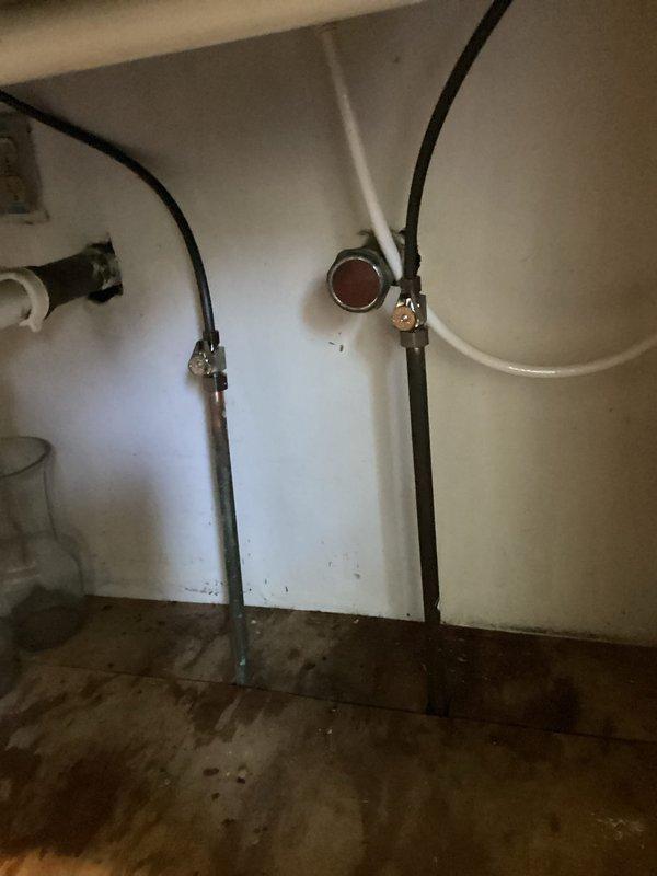 Responded to service call for leaking kitchen faucet in residential property. Upon inspection, identified active leak at faucet base with visible water damage and staining in cabinet below sink, indicating ongoing moisture issue. Disassembled chrome single-lever faucet assembly, replaced worn internal cartridge and deteriorated O-rings causing the leak. Cleaned and reassembled faucet components, tested water flow and spray nozzle function, confirmed leak elimination with no dripping at base or connections. Verified all supply line connections under sink were secure and dry upon completion.
