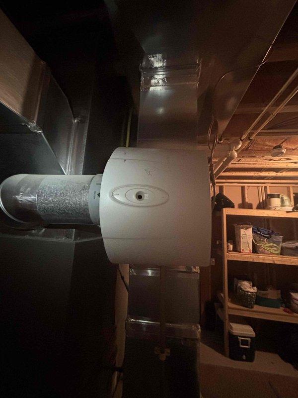 Responded to no hot water call at single-family residence with active leak from original 16-year-old Bradford 65-gallon standard tank water heater. Upon arrival, confirmed unit was actively leaking and had reached end of serviceable life, resulting in complete loss of hot water to home with 3 showers and large soaker tub. Documented existing equipment and utility room conditions with photos showing water heater, copper supply lines, pressure tank, and mechanical room layout for customer records and replacement planning recommendations.
