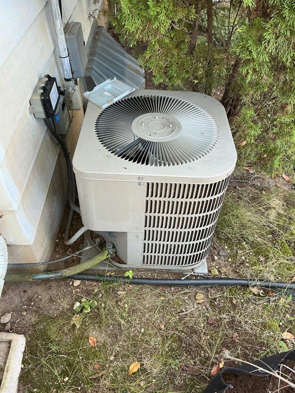 # CP-Cooling Problem Resolution

Responded to service call for 10-year-old air conditioning system that had tripped the circuit breaker and exhibited cooling performance issues. Upon arrival, conducted comprehensive inspection of outdoor condenser unit and electrical components.

Removed and inspected electrical compartment, revealing significant corrosion and deterioration on contactor assembly with visible rust staining throughout the panel. Identified heavily corroded contactor as primary failure point causing electrical overload and breaker trip. Capacitor showed signs of age but terminals remained intact with proper wire connections in place.

Cleaned electrical compartment of accumulated dirt, debris, and corrosion. Replaced failed contactor with new unit, ensuring all wire connections—including yellow, red, purple, blue, orange, and ground wires—were properly terminated and secured. Verified capacitor functionality and all electrical connections for integrity.

Tested system ope