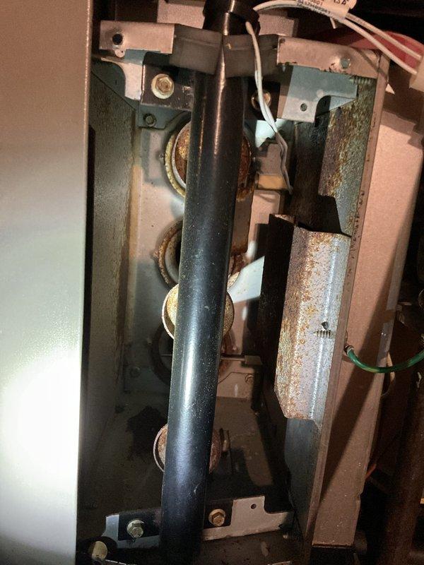Responded to no-heat call on 20-year-old Lennox furnace. Upon inspection, found extensive rust and corrosion throughout critical mechanical components, including blower assembly mounting brackets, connecting joints, and fittings. Corrosion was severe enough to compromise structural integrity and safe operation of the unit. Documented deteriorated condition with photographs showing oxidation on metal surfaces, corroded mounting hardware, and aging internal components. Due to the age of the equipment and extent of deterioration observed, recommended full system replacement as the most cost-effective and safe solution rather than attempting repairs on compromised components.