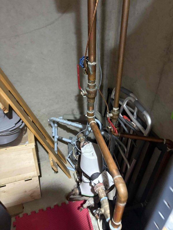 Replaced exterior outdoor spigot with new frost-proof faucet assembly. Accessed supply lines through basement utility area, shut off water supply at main valve, and disconnected existing copper piping. Installed new spigot with proper pitch for drainage, soldered copper connections, and tested for leaks. Verified proper operation and restored water service to exterior hose bib.