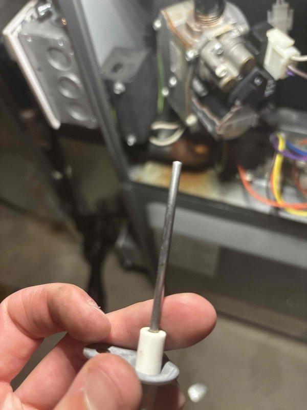 Responded to no heat call on 6-year-old EnergiAir furnace where heating system was not operating while air conditioning functioned normally. Upon inspection, identified failed flame sensor preventing ignition sequence from completing. Removed contaminated flame sensor, cleaned component thoroughly, and reinstalled to restore proper flame detection. Verified furnace ignition, confirmed proper heating operation throughout all cycles, and tested system to ensure full functionality was restored to the home.