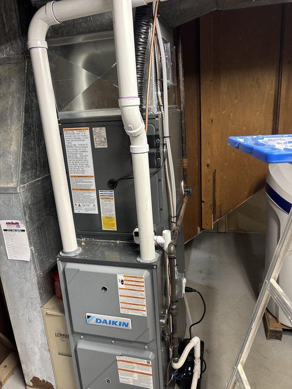 Responded to customer complaint of cold air infiltration from ductwork system. Inspected Daikin furnace installation and associated ductwork in mechanical room, identifying air leakage points around duct connections. Sealed compromised duct joints and connections to eliminate unwanted air flow and improve system efficiency.