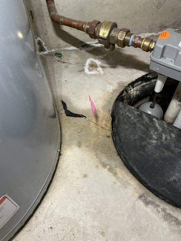 Responded to service call for leaking water heater. Upon arrival, inspected 9-year-old residential water heater and found severe corrosion and rust damage at the base of the tank with visible water leakage onto the concrete floor. The tank bottom showed extensive deterioration with rust accumulation spreading outward from the unit, indicating tank failure. Documented the condition with photographs showing the corroded base, water staining on the surrounding floor, and compromised tank integrity. Advised customer that the water heater tank has failed and requires replacement, as the corrosion damage is beyond repair and poses risk of continued leaking or catastrophic failure.