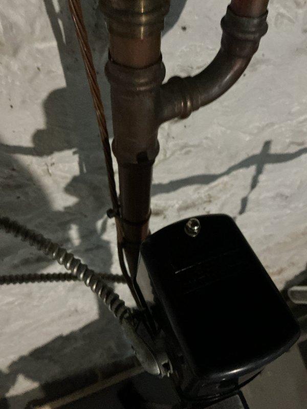 Completed QUOTR-quoted repair involving replacement of well pressure tank, pressure switch, and associated tee fittings. Removed old corroded components showing significant oxidation and wear, installed new pressure tank with proper mounting, new brass tee configuration, and new pressure switch with appropriate electrical connections. System tested and operational upon completion.