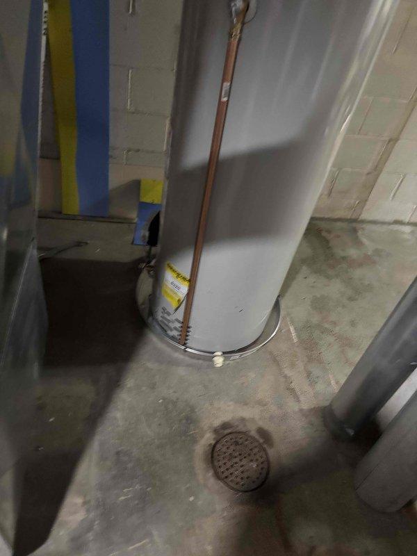 Completed installation of 50-gallon natural gas water heater with 6-year tank and 6-year parts warranty, including water softener installation. Updated chimney Y-connector from 3-inch to 4-inch to meet current venting requirements and ensure proper exhaust flow for the new unit. Provided estimate for additional plumbing work to install drainage for bathroom sink and tub as requested by homeowner.