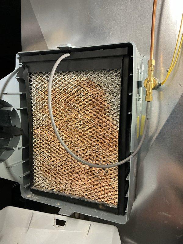 Completed comprehensive furnace super tune-up on EnergiAir system with warranty through April 2033. Performed full system inspection, accessed and evaluated evaporator coil assembly showing dust accumulation on mesh filter, documented condition of internal components including blower assembly and refrigerant lines. All mechanical components, electrical connections, and safety controls tested and verified operational; system returned to proper working order with photographic documentation of pre-service conditions.