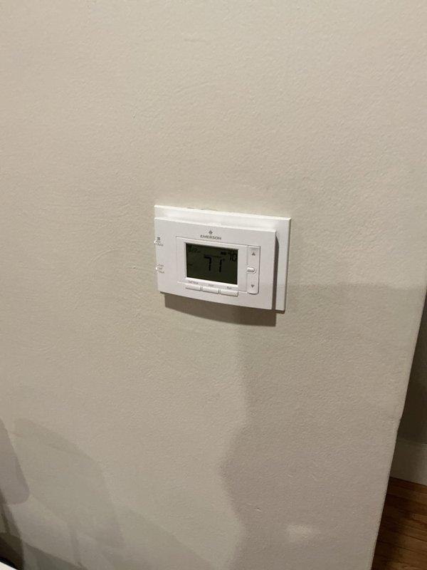 # No Heat Service Call

Responded to no heat condition on HVAC system. Upon arrival, found thermostat set to 71°F but unit not operating. Removed access panel and performed thorough inspection of furnace interior. Discovered blower motor assembly and electrical connections heavily contaminated with dust, debris, and biological growth. Multiple wire terminals showed signs of oxidation and corrosion affecting electrical continuity. Lower burner compartment exhibited significant accumulation of dirt and particulate matter restricting airflow and preventing proper ignition sequence.

Cleaned all electrical connections and terminals, removing corrosion from mounting plate and wire connectors. Vacuumed and cleaned blower motor housing and lower burner assembly, removing heavy debris buildup. Verified all wire connections were secure and making proper contact. Tested unit operation and confirmed ignition sequence completed successfully. System now heating properly with thermostat maintaining 