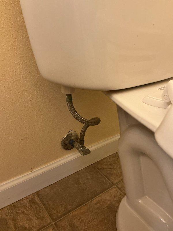 Responded to call for toilet overfilling issue. Upon arrival, removed tank lid and inspected internal flush mechanism. Found fill valve failing to shut off properly at designated water level, causing continuous water flow and tank overfilling. Adjusted fill valve float and water level setting. Tested flush cycle multiple times to verify proper fill valve shutoff and appropriate water level in tank. Confirmed flapper valve sealing correctly and overflow tube functioning as designed. Verified water supply line and angle stop valve connections secure with no leaks present. System operating normally upon completion with tank filling to proper level and shutting off automatically.