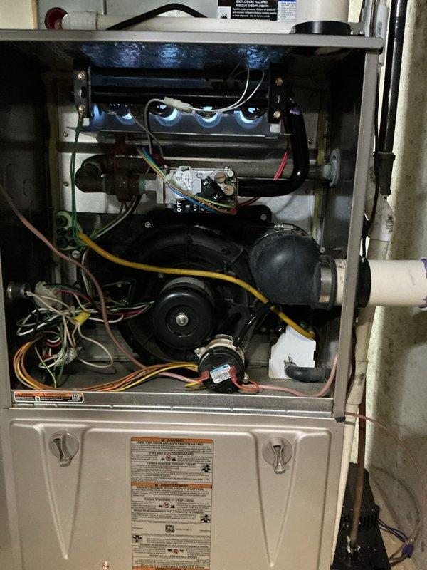 Replaced primary heat exchanger and coupling box assembly on residential gas furnace due to heat exchanger failure. Removed and disposed of failed heat exchanger components, installed new primary heat exchanger with coupling box, and reassembled burner assembly with proper sealing and alignment. Replaced failed condensate pump with new unit, including PVC discharge piping and electrical connections. Verified proper furnace ignition sequence, confirmed blue flame combustion at burners, and tested all safety controls. System tested and operational with no leaks detected.