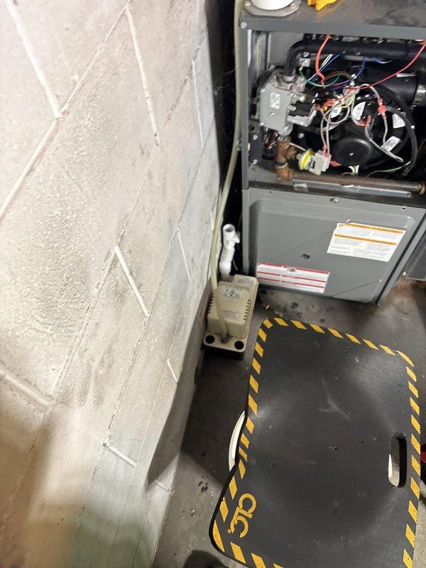 Completed comprehensive furnace super tune-up on residential gas furnace unit. Performed full system inspection with access panel removal to evaluate internal components including blower motor, electrical connections, capacitor, and wiring harness. All colored wires (red, blue, black, yellow, white) inspected for proper connections and signs of wear. Verified blower motor operation and checked all mechanical components for proper function. Inspected condensate pump auxiliary device for proper operation. Cleaned and serviced unit as needed. All safety labels and manufacturer data plates verified present and legible. System tested and confirmed operating within normal parameters upon completion.