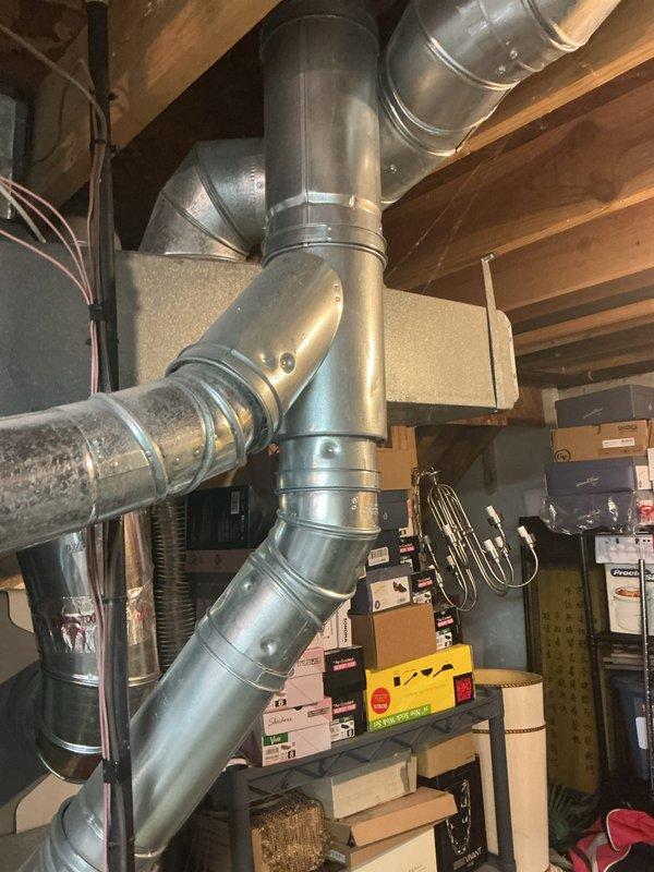 Conducted free estimate for proactive replacement of 18-year-old standard tank water heater located in basement. Unit currently functioning without leaks, malfunctions, or performance issues. Inspected existing installation including copper supply lines, brass fittings, gate valves, and venting system; documented tank condition showing age-related surface discoloration and water staining on galvanized exterior. Assessed installation area accessibility, clearances, and existing plumbing connections to provide accurate replacement specifications and pricing options for future planned upgrade.