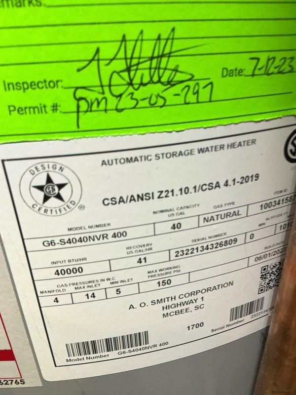 Responded to no cooling call where AC unit would not power on and fan was inoperative. Upon inspection, discovered issue was related to water heater rather than air conditioning system. Examined A.O. Smith 40-gallon natural gas water heater, model G6-S4040NVR 400, serial number 2322134326809. Inspected control board and found evidence of heat damage and component failure with visible burn marks and discoloration on circuit board. Documented equipment specifications and electrical damage with photos. Unit requires control board replacement to restore proper operation.