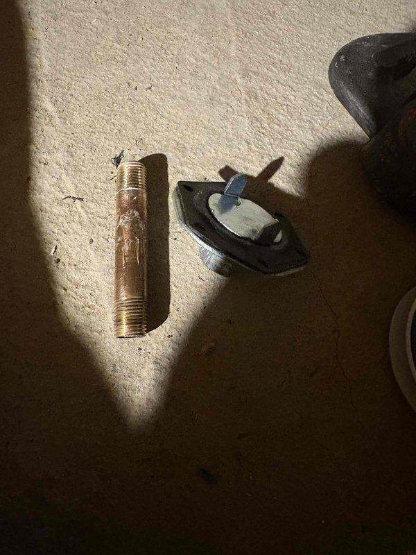 Responded to a plumbing leak at the pressure switch on a residential well water system. Upon inspection, identified a failed brass pipe nipple connection at the pressure switch assembly mounted on the pressure tank. Shut down the system and relieved pressure from the tank. Removed the defective brass nipple fitting and associated components from the pressure switch. Installed new brass pipe nipple with proper thread sealant to ensure a watertight connection. Reassembled the pressure switch assembly with new fittings and verified all connections were secure. Restored power to the system, cycled the pump, and monitored the pressure switch through multiple on/off cycles to confirm proper operation and no leaks. System tested and returned to normal service with no additional issues detected.