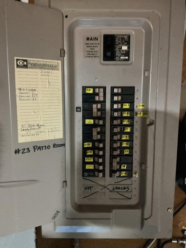 Conducted on-site evaluation for furnace replacement estimate in single-family residence with approximately 20-year-old heating system. Inspected existing electrical panel and circuit breaker configuration to assess compatibility and capacity for new furnace installation. Documented electrical infrastructure, including main breaker panel with labeled circuits and available spaces for potential electrical modifications required for equipment upgrade.