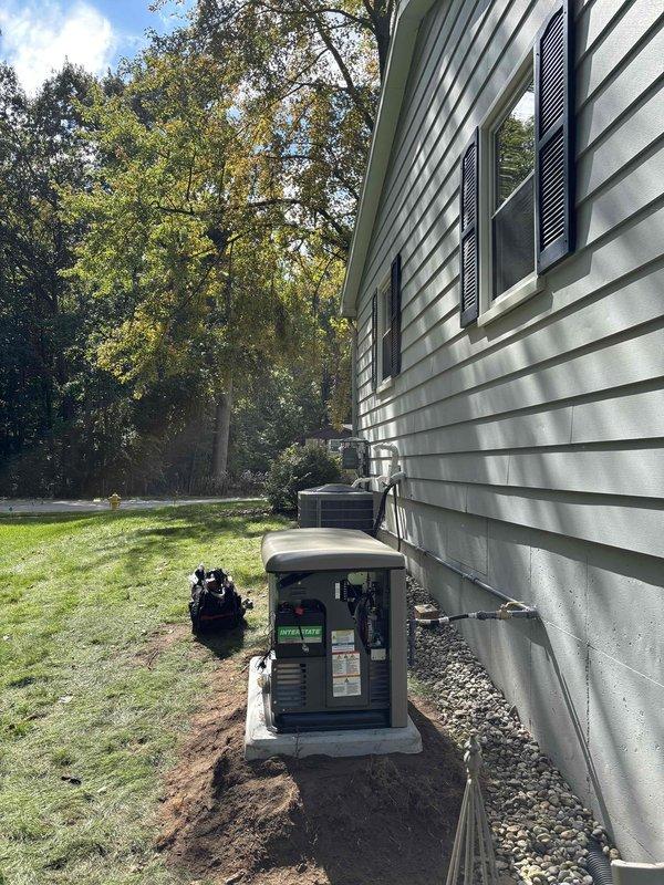 Successfully installed 20KW Kohler standby generator with 100A transfer switch on concrete pad adjacent to residential structure. Coordinated utility disconnect and reconnect services, replaced main electrical panel to accommodate generator integration, and completed all electrical connections per manufacturer specifications. System was pressure tested, inspected by municipal electrical inspector, and verified operational upon utility reconnection.