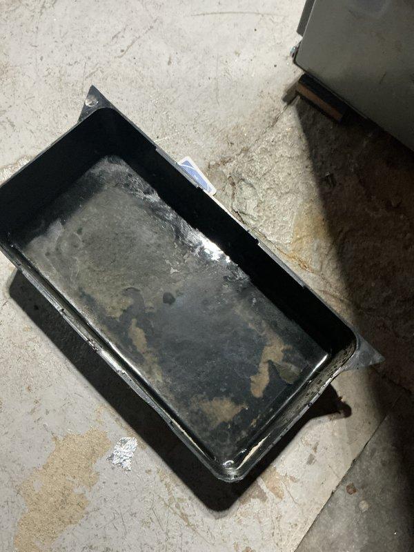 Completed annual cooling maintenance on 17-year-old Heil system with condenser model year 2021. Performed standard tune-up procedures including system inspection, cleaning, and operational testing. Documented drain pan condition showing normal wear and residue accumulation consistent with system age.