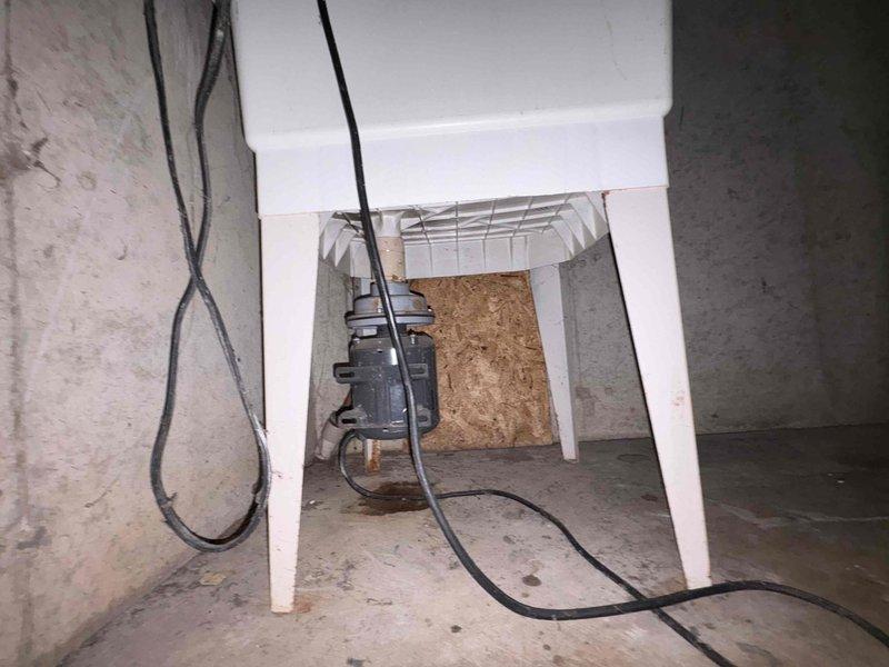 Responded to plumbing service call for low water pressure and continuously running toilet. Upon inspection, assessed water supply system and plumbing infrastructure in basement utility area. Diagnosed toilet fill valve malfunction causing constant water flow. Adjusted fill valve mechanism and verified proper shutoff operation. Tested water pressure throughout system and confirmed adequate flow restoration. Documented existing plumbing configuration and mechanical room conditions with photos for service records.