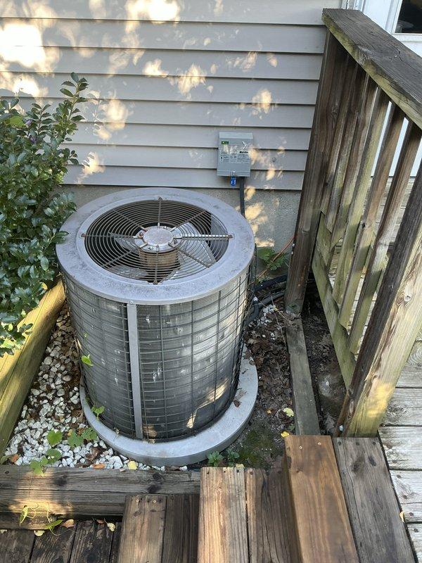 Provided estimate for replacement of 26-year-old residential air conditioning system. Evaluated existing outdoor condenser unit showing significant age-related wear and deterioration, along with indoor HVAC components including ductwork and associated mechanical equipment. Documented current system condition through photographs and presented replacement options to address aging equipment that has exceeded typical service life expectancy.
