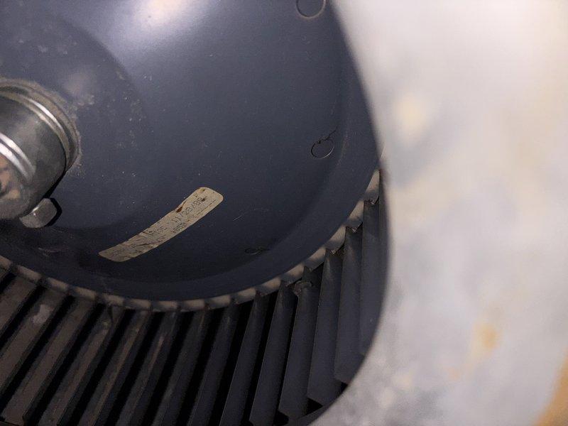 Completed annual heating maintenance on 16-year-old furnace system. Performed standard inspection of blower assembly, verified proper operation of squirrel cage fan and motor components, documented equipment specifications from manufacturer's data plate, and captured condition photos of blower wheel and unit identification information for service records.