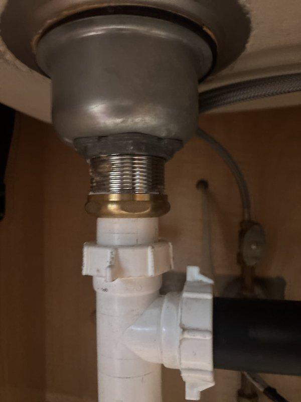 Returned to property to complete previously quoted garbage disposal replacement. Removed existing disposal unit and installed new unit beneath kitchen sink, connecting to existing drain assembly and plumbing infrastructure. Verified proper operation of new disposal, tested for leaks at all connection points, and confirmed secure mounting to sink flange. Work completed within estimated 2-hour timeframe with customer present on-site.