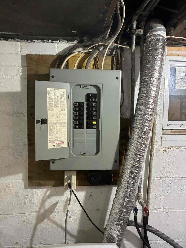 Responded to no-heat call on 7-year-old furnace that initially fired up after summer shutdown but subsequently failed to operate. Performed diagnostic evaluation and determined gas valve failure as root cause of heating system malfunction. Documented electrical panel and HVAC infrastructure with photos, provided estimate for gas valve replacement to restore whole-home heating functionality.