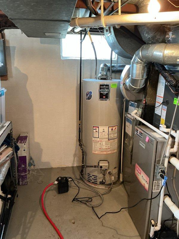 Completed comprehensive water heater tune-up on 9-year-old residential unit installed in 2019. Performed standard maintenance procedures including inspection of all components, testing of temperature and pressure relief valve, verification of proper venting and combustion, and flushing of sediment from tank. All systems found to be operating within normal parameters with no issues identified.