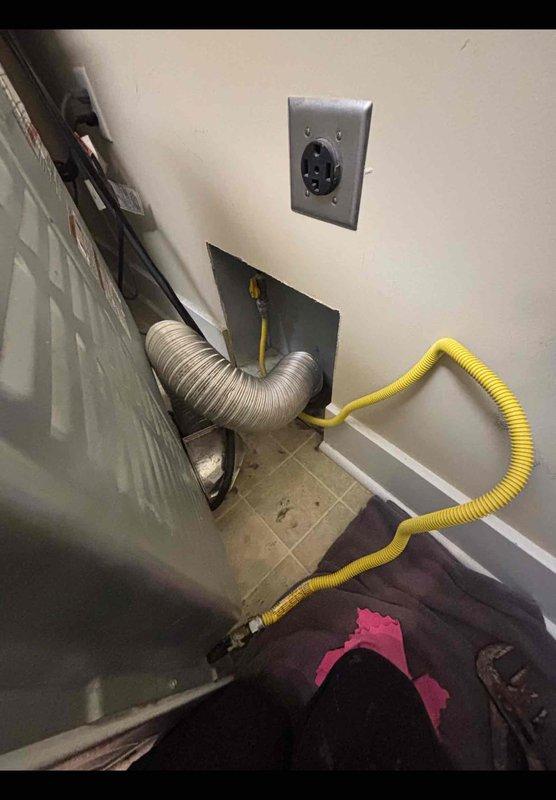 Responded to customer concern regarding natural gas odor near dryer connection following previous flex line replacement by handyman. Performed thorough inspection of gas supply line, connections, and newly installed dryer flex hose at wall penetration. Applied soap bubble test to all gas fittings and connections to verify system integrity. Confirmed all connections were properly sealed with no leaks detected. Advised customer that odor may be residual gas dissipating from previous minor leak and recommended monitoring. Documented installation with photos for customer records.