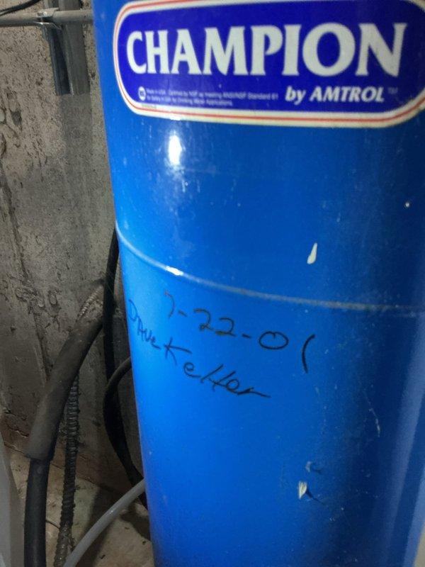 Responded to water pressure complaint following recent water heater installation. Upon inspection, identified issue related to pressure tank system in basement utility area. Verified Champion by Amtrol pressure tank connections, checked valve operation at tank base, and confirmed proper system pressurization to restore adequate water pressure throughout residence.