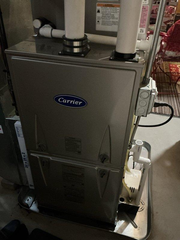 Completed annual heating maintenance on Carrier brand furnace system. Performed comprehensive tune-up inspection including combustion analysis, heat exchanger examination, blower motor operation verification, and gas pressure testing. All components found operating within manufacturer specifications with no deficiencies noted.