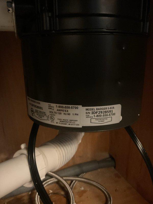 Completed garbage disposal replacement under kitchen sink. Removed old unit and installed new InSinkErator Badger+ 3/4 HP disposal with proper electrical connections and drain plumbing. Verified all connections are secure, tested unit operation, and confirmed no leaks present.