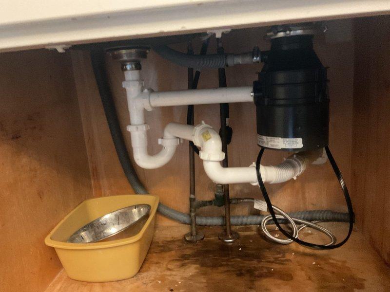 Completed garbage disposal replacement under kitchen sink. Removed old unit and installed new InSinkErator Badger+ 3/4 HP disposal with proper electrical connections and drain plumbing. Verified all connections are secure, tested unit operation, and confirmed no leaks present.