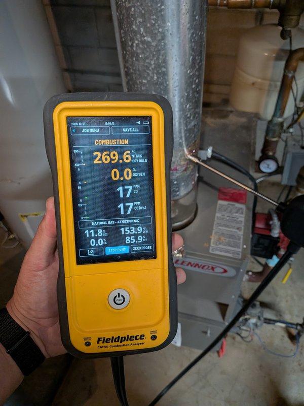Completed annual heating maintenance on 18-year-old Lennox heating system. Performed comprehensive combustion analysis using Fieldpiece analyzer, confirming proper oxygen levels and combustion efficiency within acceptable parameters. Documented significant rust and corrosion on solenoid valve assembly and mounting bracket, indicating moisture exposure and age-related deterioration that should be monitored for potential future replacement.