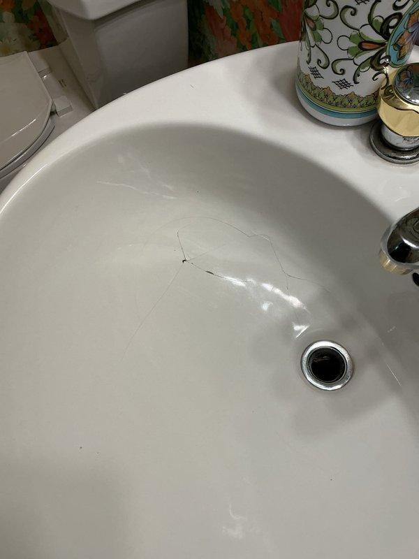 Responded to service call for loose toilet in master bathroom and pedestal sink replacement consultation. Secured toilet to floor by tightening closet bolts and checking wax ring seal for proper installation. Verified toilet stability and tested for any rocking or movement. Assessed existing pedestal sink for replacement, taking measurements of current installation height and discussing fixture options with customer. Documented sink dimensions and plumbing configuration with photographs for future replacement planning. All plumbing connections inspected and found to be functioning properly with no leaks detected.