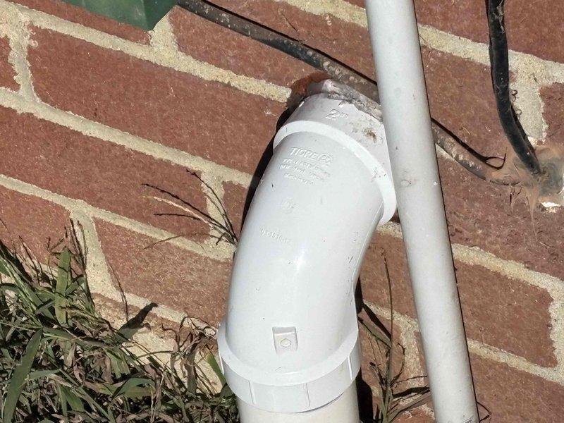 Replaced existing sump pump system with new unit, including installation of new discharge piping routed through basement wall to exterior. Secured all PVC drainage lines with proper mounting straps and verified proper pitch for optimal water flow and system operation.