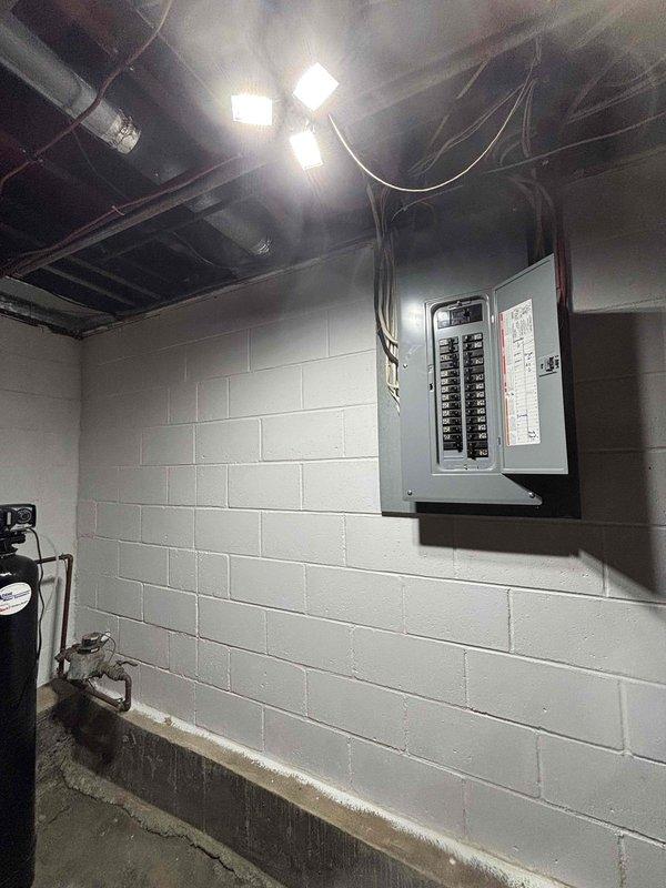 Completed electrical estimate for combining split meter system serving both gas and electric utilities in residential basement. Evaluated existing electrical panels, service entrance configuration, and current wiring infrastructure to determine feasibility and scope of consolidating separate metered services into single meter base. Assessment included inspection of dual panel setup, circuit breaker configurations, and utility room conditions to provide comprehensive proposal for meter combination project.