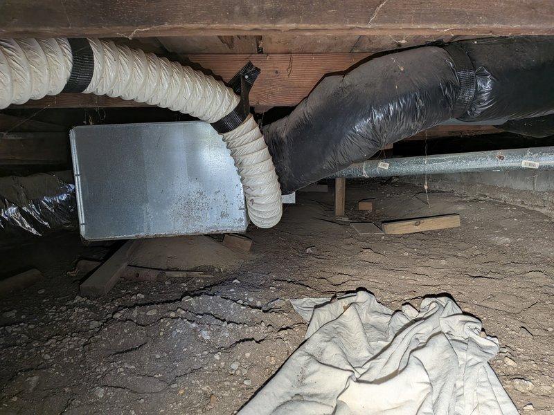 Responded to no-heat call for 28-year-old furnace located in crawl space. Upon inspection, found furnace failing to ignite. Accessed unit through exterior crawl space entry, navigating confined area with HVAC ductwork and air handler components. Diagnosed ignition system failure on aging equipment. Due to advanced age of unit and extent of required repairs, provided recommendations for system replacement options to restore reliable heating operation.