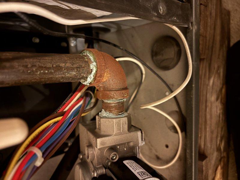 Completed annual heating maintenance on furnace system per club membership agreement. Performed comprehensive tune-up including inspection of all major components, burner assembly, heat exchanger, blower motor, and electrical connections. Verified proper operation of gas valve, ignition system, and safety controls. Cleaned blower assembly and checked amp draw on blower motor. Tested temperature rise and confirmed within manufacturer specifications. Noted system does not have humidifier installed. Observed corrosion on copper gas line at 90-degree elbow joint near gas valve connection; documented condition with photos for customer awareness. All control wiring secure and properly routed. System operating safely and efficiently. Unit is approximately 10 years old and in good overall condition. No immediate repairs required at this time.