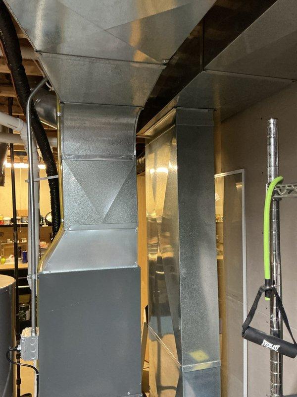 Completed annual heating maintenance on 4-year-old Amana furnace system. Performed comprehensive tune-up including inspection of ductwork, condensate pump operation, and drain pan condition. System operating properly with no humidifier present; documented equipment condition with photos for service records.