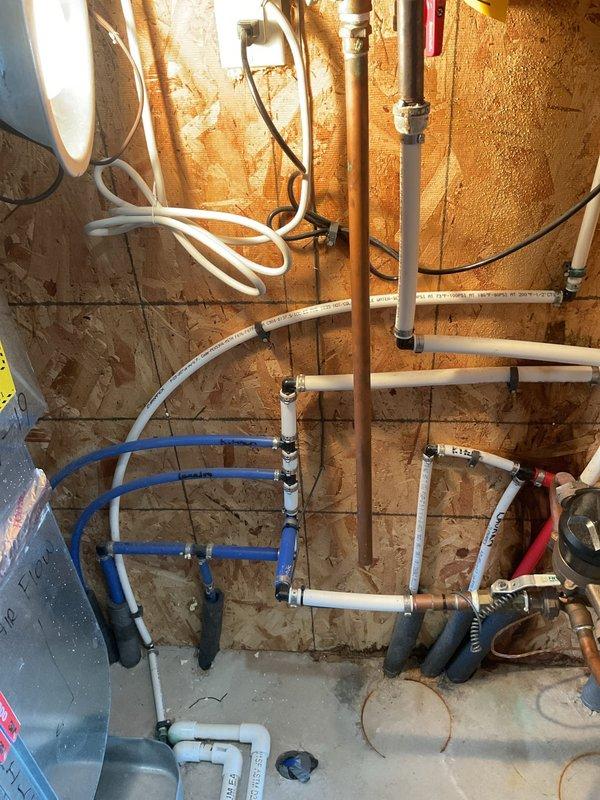 Completed tankless water heater tune-up on 7-year-old Navien unit. Replaced leaking copper pipe section beneath the tankless water heater and installed new T-valve for faucet connection as requested. Performed standard maintenance inspection, verified proper operation of all components, and confirmed no active leaks upon completion.