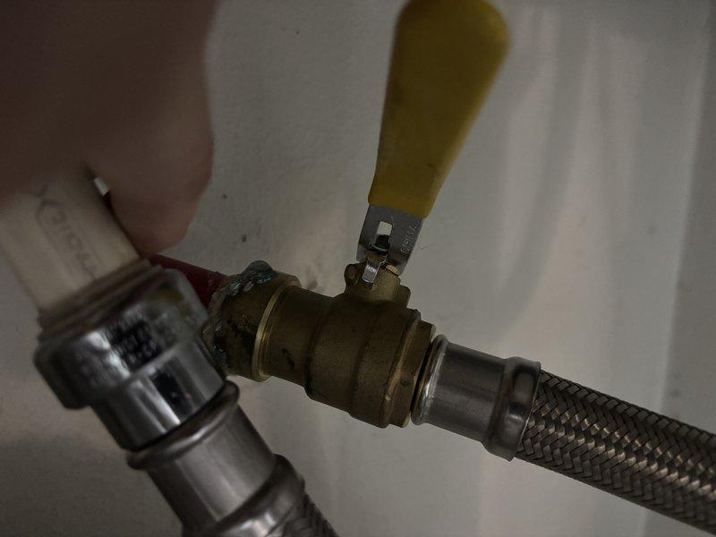 Responded to a water heater leak on a 5-year-old unit. Upon inspection, identified failed connection at the cold water inlet with corroded brass ball valve and deteriorated flexible supply line. Replaced the defective section including the inlet valve assembly and braided stainless steel supply hose. Tested system for proper operation and verified no additional leaks present after restoration of water supply.